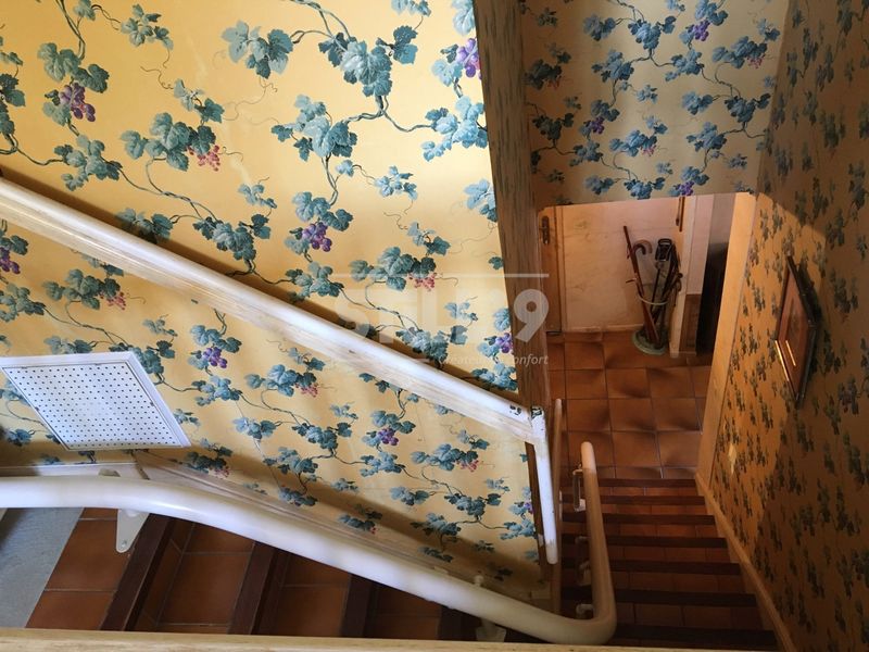 Fixation d'une chaise élévatrice pour escalier vers Voisins Le Bretonneux 78